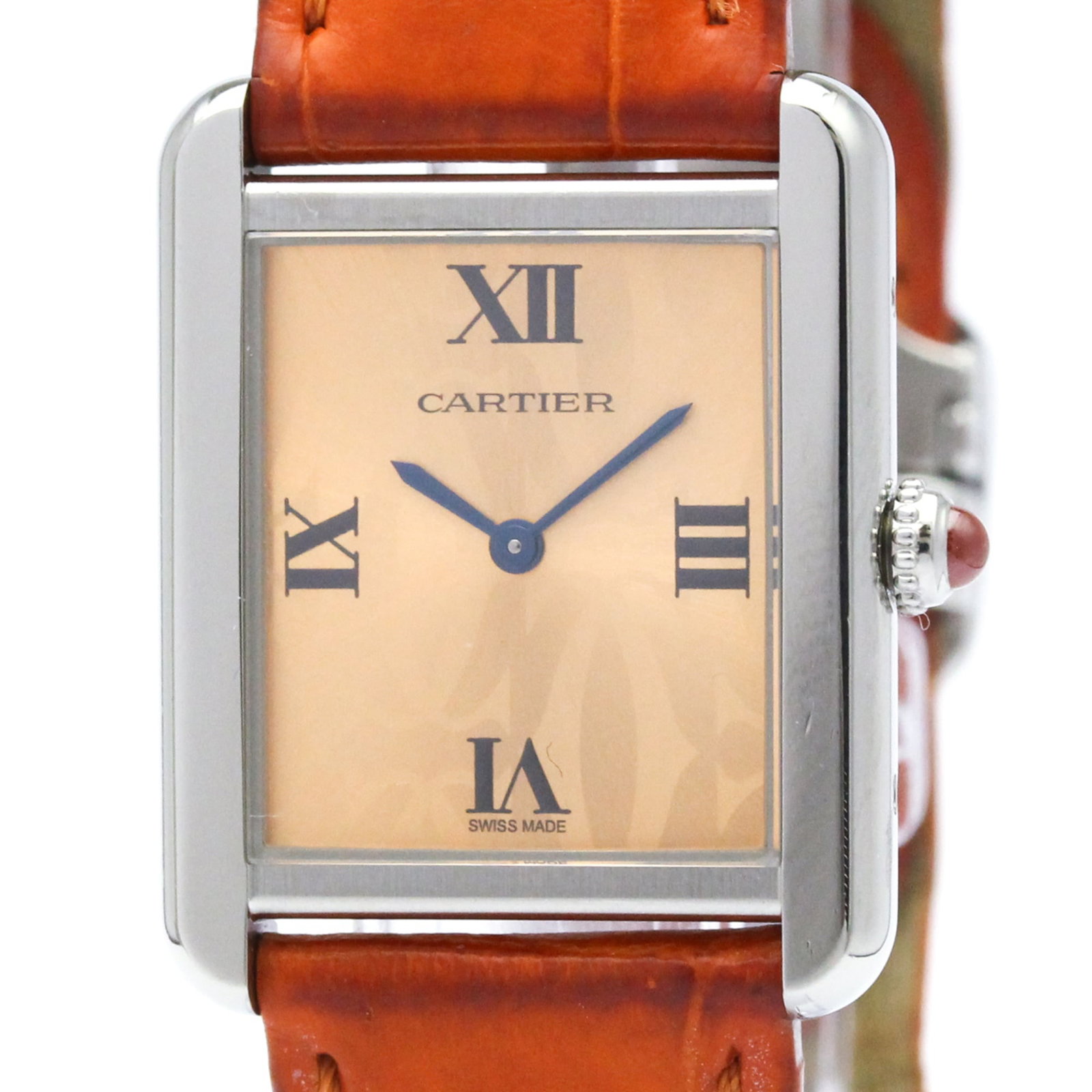 Cartier Wristwatch: Cartier Wristwatch Stainless steel case and leather band make for a sleek, sophisticated timepiece. The Cartier Tank Solo watch boasts an orange dial, adding a pop of vibrant color to its classic
