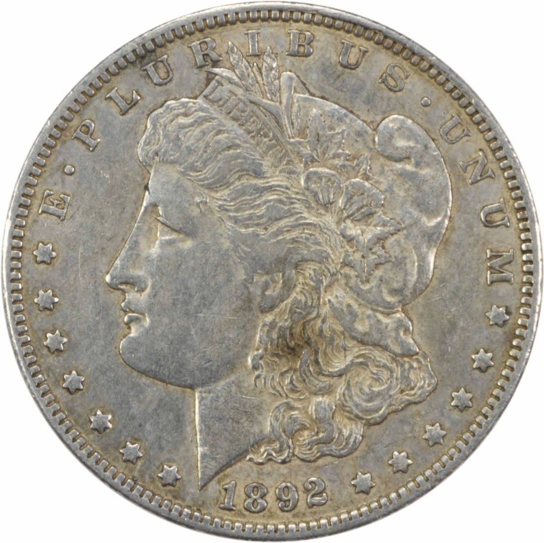 1892-O Morgan Silver Dollar EF Uncertified: 1892-O Morgan Silver Dollar EF Uncertified The 1892-O Morgan Silver Dollar EF Uncertified boasts an impressive EF grade, indicating excellent condition with minimal wear. This circulated coin features