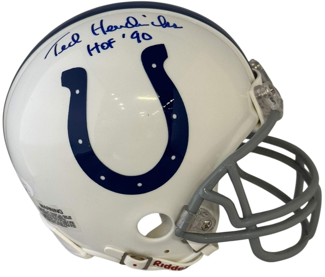 Ted Hendricks Autographed Colts Helmet JSA: Ted Hendricks Autographed Colts Helmet JSA Signed by Ted Hendricks, the legendary Baltimore Colts defensive tackle, this JSA authenticated mini helmet bears his signature in blue sharpie across the