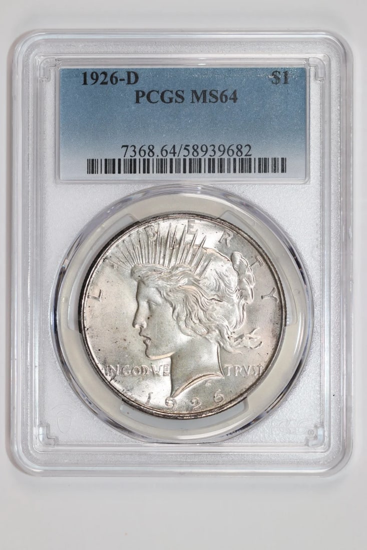 1926-D PEACE DOLLAR PCGS MS64: 1926-D PEACE DOLLAR PCGS MS64 The 1926-D Peace Dollar, graded MS64 by PCGS, boasts a rich history and exceptional condition. This silver dollar, minted in Denver, features a striking design that