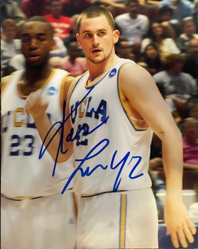 Kevin Love Autographed Basketball 8x10 Photo: Kevin Love Autographed Basketball 8x10 Photo Signed across the front of the photo in blue sharpie, this 8x10 inch basketball features an autograph from Kevin Love, a standout player for the UCLA
