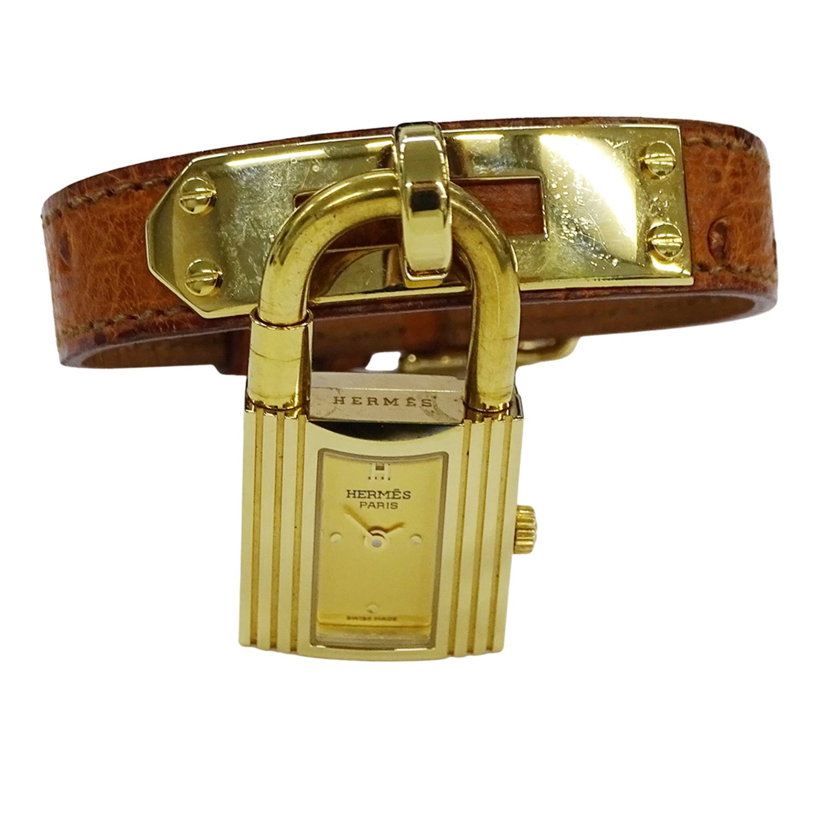 Hermes Wristwatch: Hermes Wristwatch Gold plated Hermes wristwatch with leather band, featuring a gold dial and quartz movement. This stylish timepiece boasts a sleek design with a case diameter of 20mm, suitable for wr
