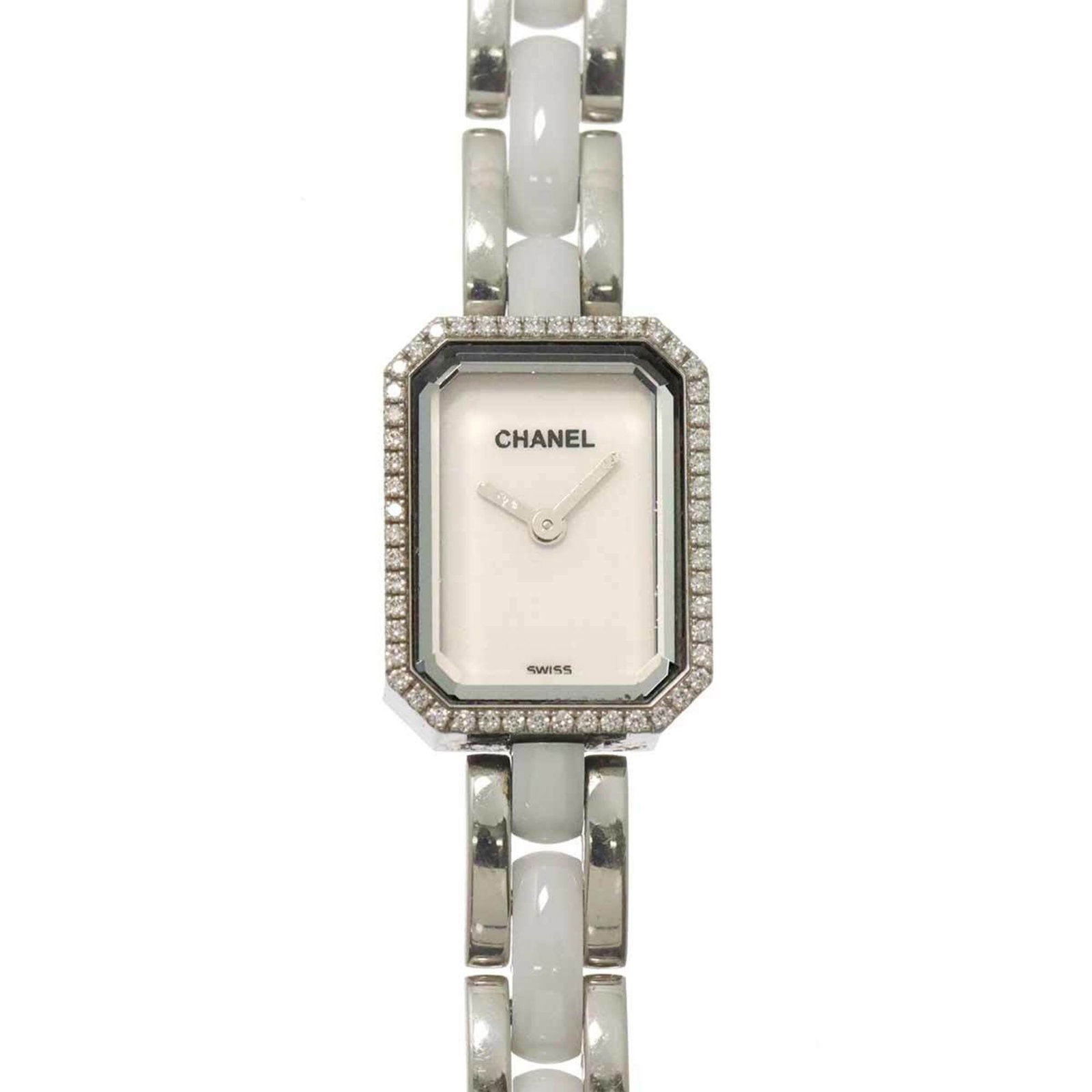 Chanel Wristwatch: Chanel Wristwatch Stainless steel case and ceramic band make this Chanel wristwatch a sleek and modern accessory. The white quartz movement powers a timepiece that's both functional and stylish, with 