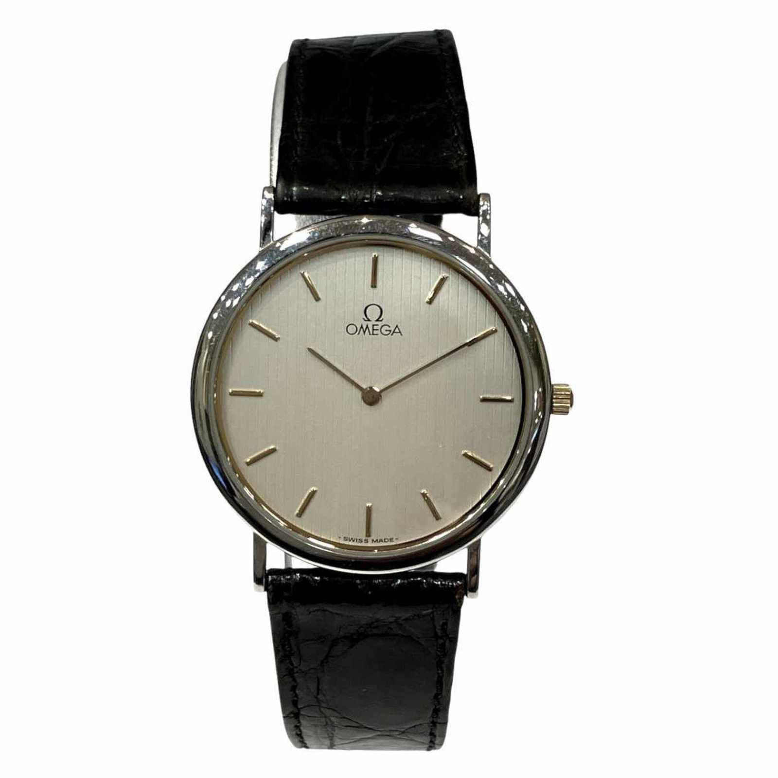 Omega Wristwatch: Omega Wristwatch Omega's stainless steel case and leather band make for a sleek and timeless design. The silver dial adds a touch of sophistication, while the quartz movement ensures reliable timekeep