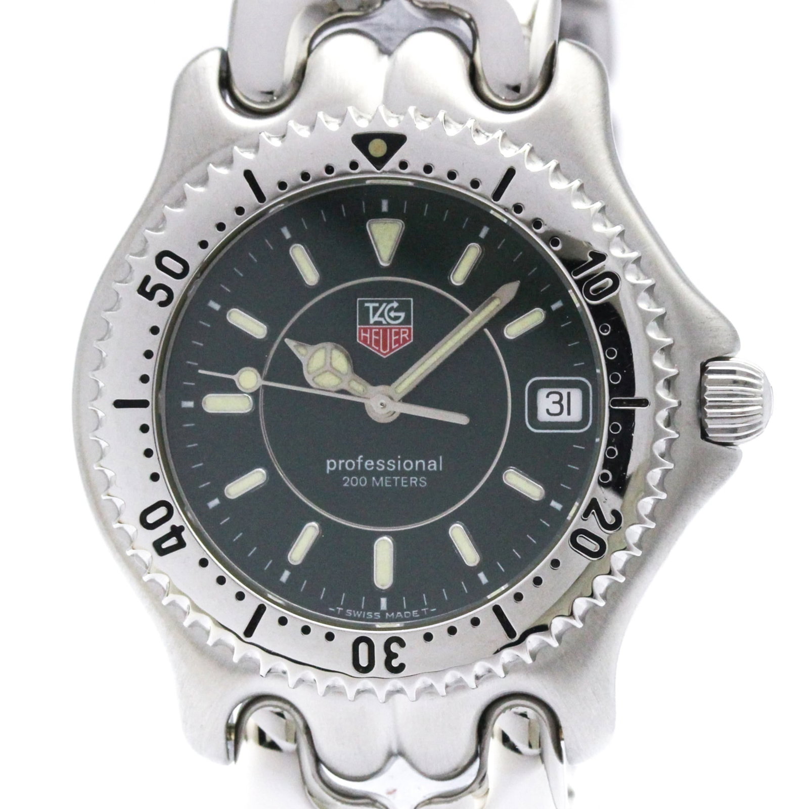 Wristwatch by Tag Heuer: Wristwatch by Tag Heuer Stainless steel case and band, the Tag Heuer WG1119 wristwatch boasts a sleek green dial. This quartz-powered timepiece features date functionality and weighs in at 110g. Its c