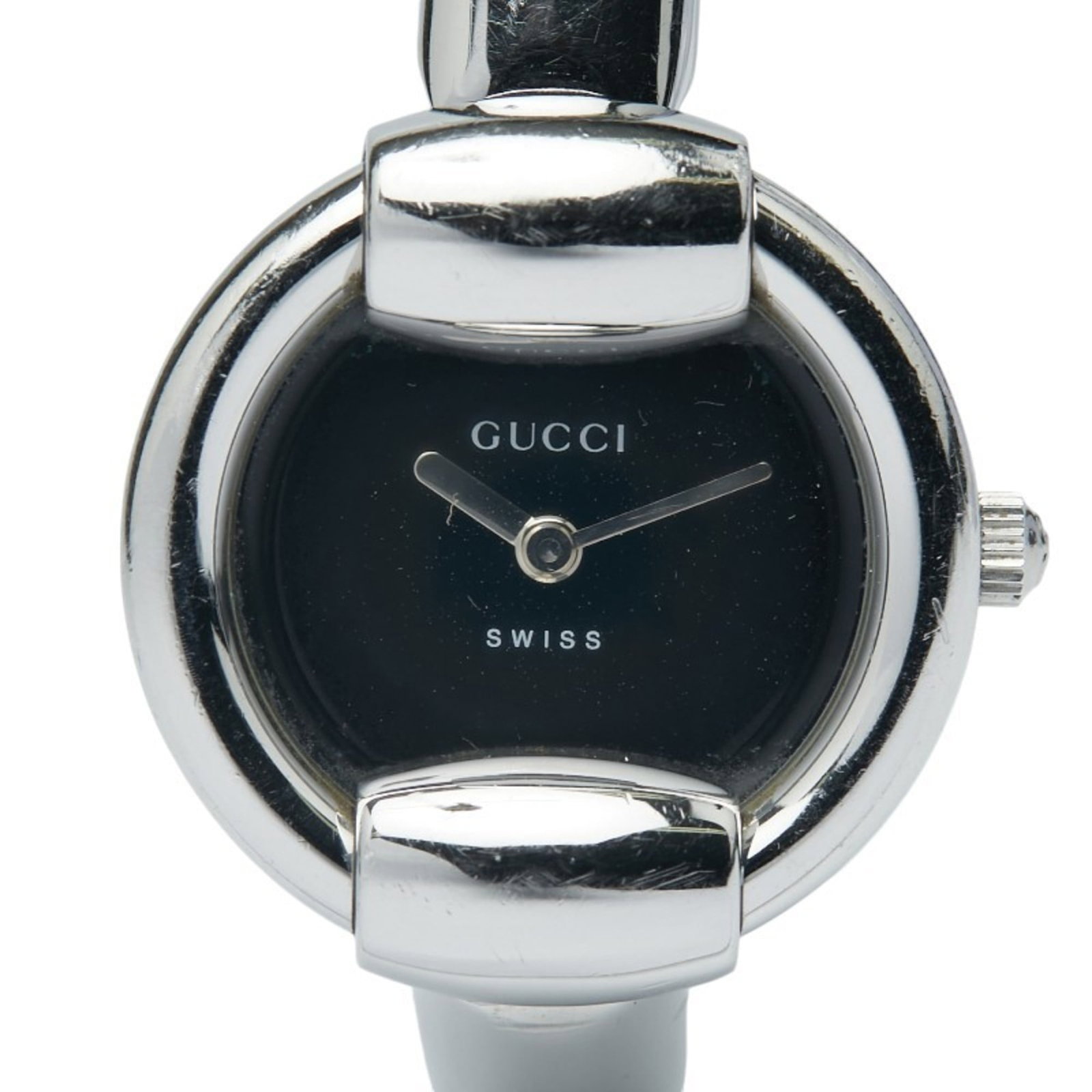 Wristwatch from Gucci: Wristwatch from Gucci Stainless steel case and band give this Gucci wristwatch a sleek, modern look. The black dial and quartz movement keep time with precision, while the compact design makes it easy