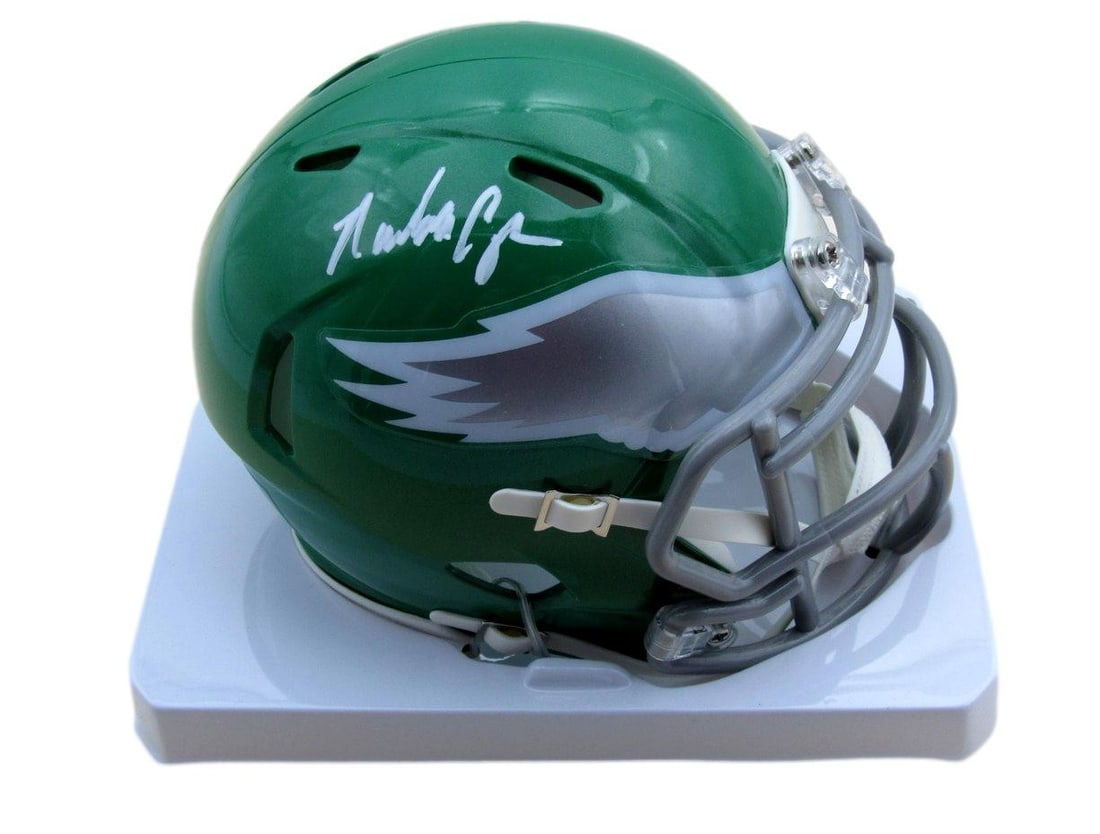 Randall Cunningham Signed Mini Speed Replica Helmet Eagles PSA/ DNA 191597: Randall Cunningham Signed Mini Speed Replica Helmet Eagles PSA/ DNA 191597 Signed by the legendary Philadelphia Eagles quarterback Randall Cunningham, this mini speed replica helmet is an authentic pi