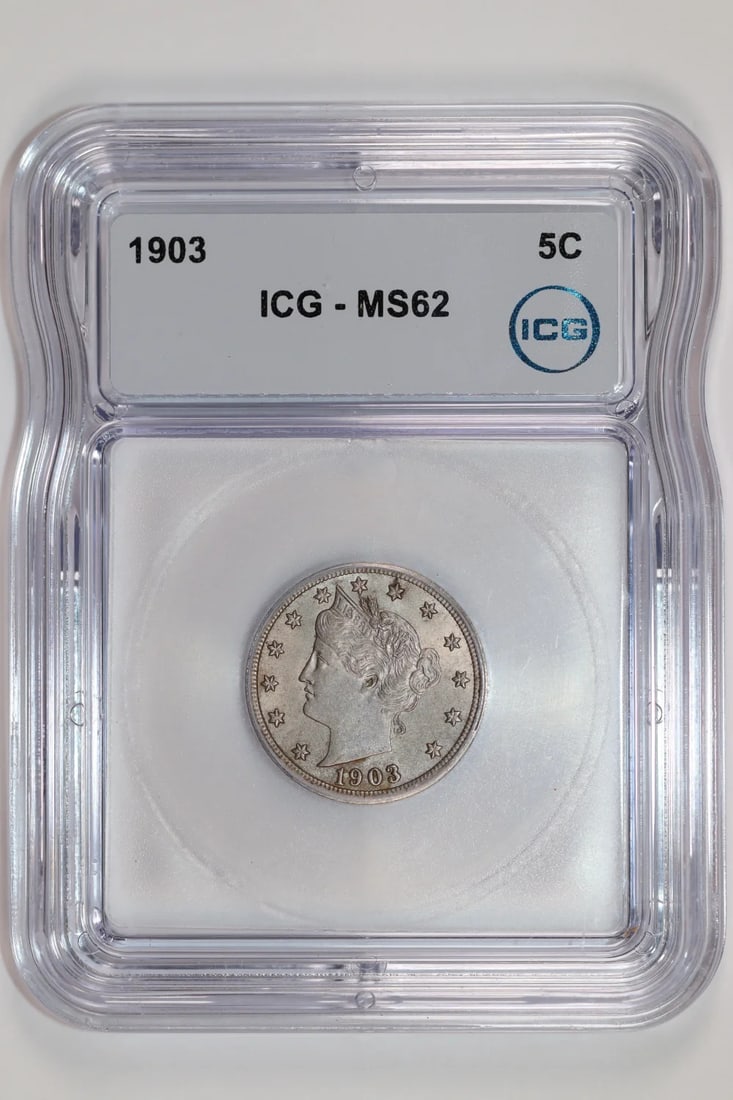 1903 LIBERTY V NICKEL ICG MS62: 1903 LIBERTY V NICKEL ICG MS62 The 1903 Liberty V Nickel ICG MS62 is an uncirculated coin featuring the iconic Liberty Head design, with its distinctive five-pointed star on the obverse and a
