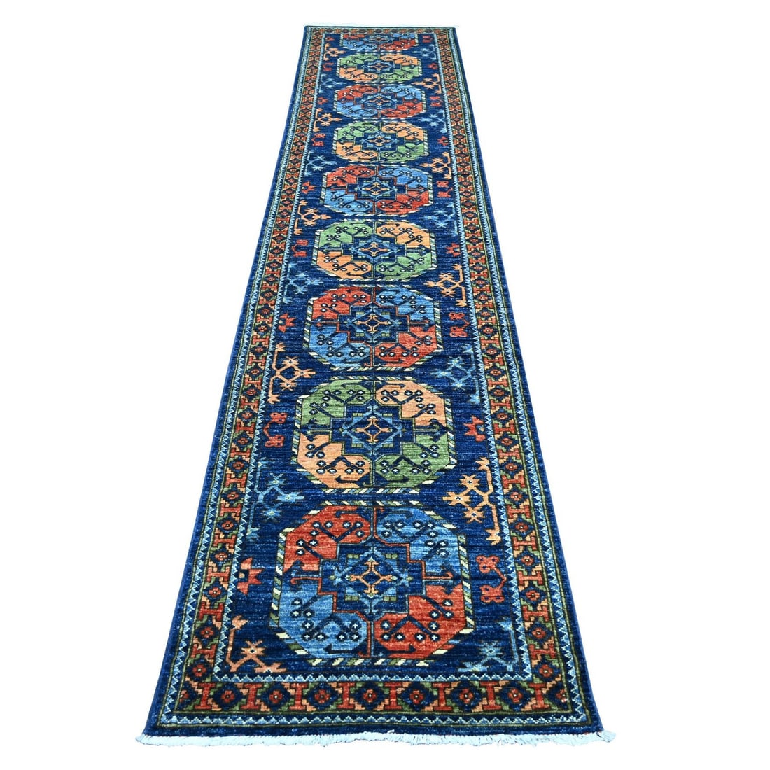 2'7"x12' Blue Afghan Ersari Elephant Feet Design Hand Knotted Wool Runner: 2'7"x12' Blue Afghan Ersari Elephant Feet Design Hand Knotted Wool Runner The 2'7"x12' Blue Afghan Ersari Elephant Feet Design Hand Knotted Wool Runner is a stunning piece of craftsmanship, boasting