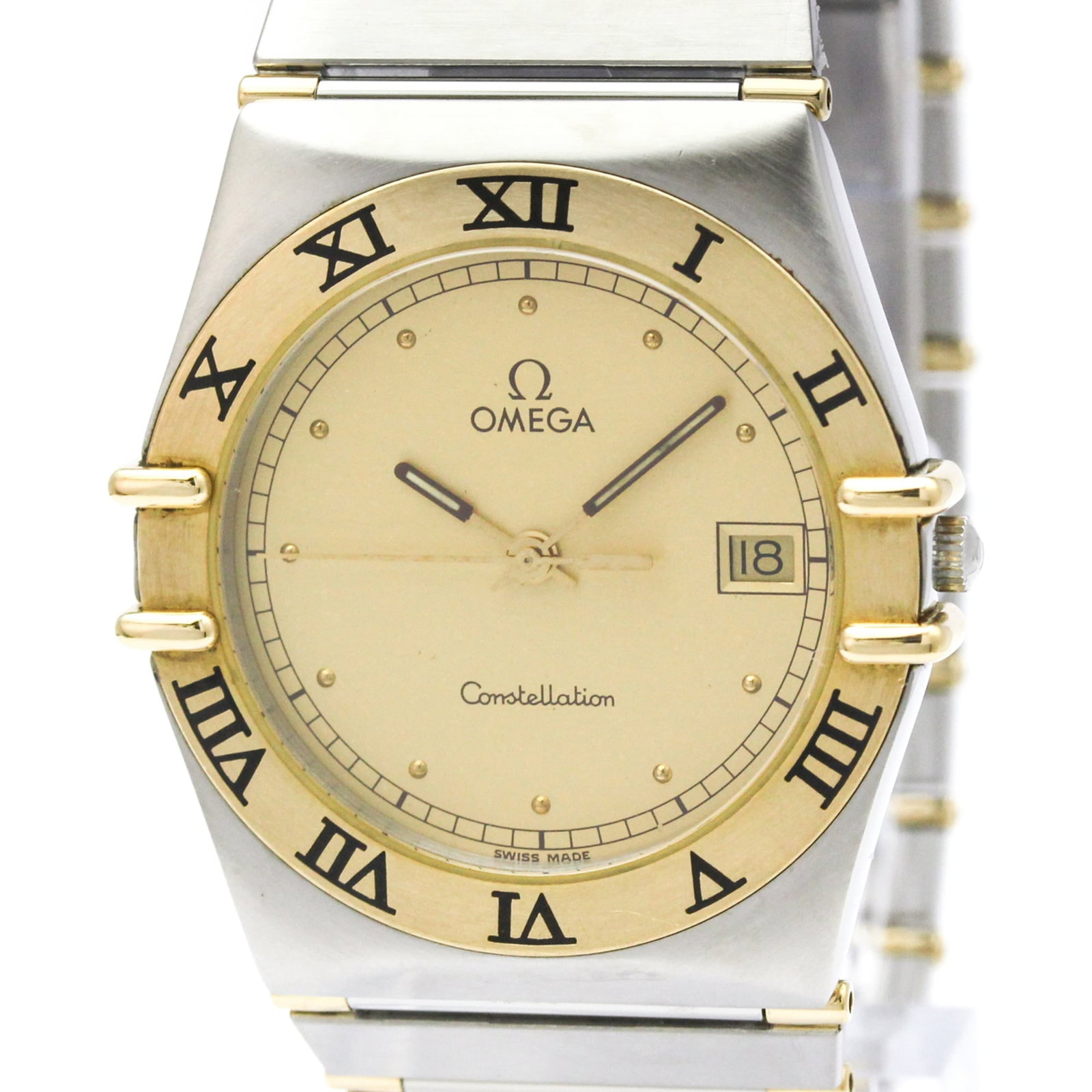 Omega Wristwatch: Omega Wristwatch Stainless steel and 18K yellow gold case and band, the Omega Constellation watch boasts a gold dial and quartz movement, making it a stylish and functional timepiece. With a sleek