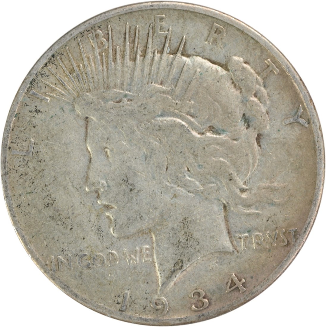 1934-S Peace Silver Dollar VF Uncertified: 1934-S Peace Silver Dollar VF Uncertified 1934-S Peace Silver Dollar in VF Uncertified Condition. This circulated coin features the iconic Peace design, minted in 1934 at the San Francisco Mint. Its