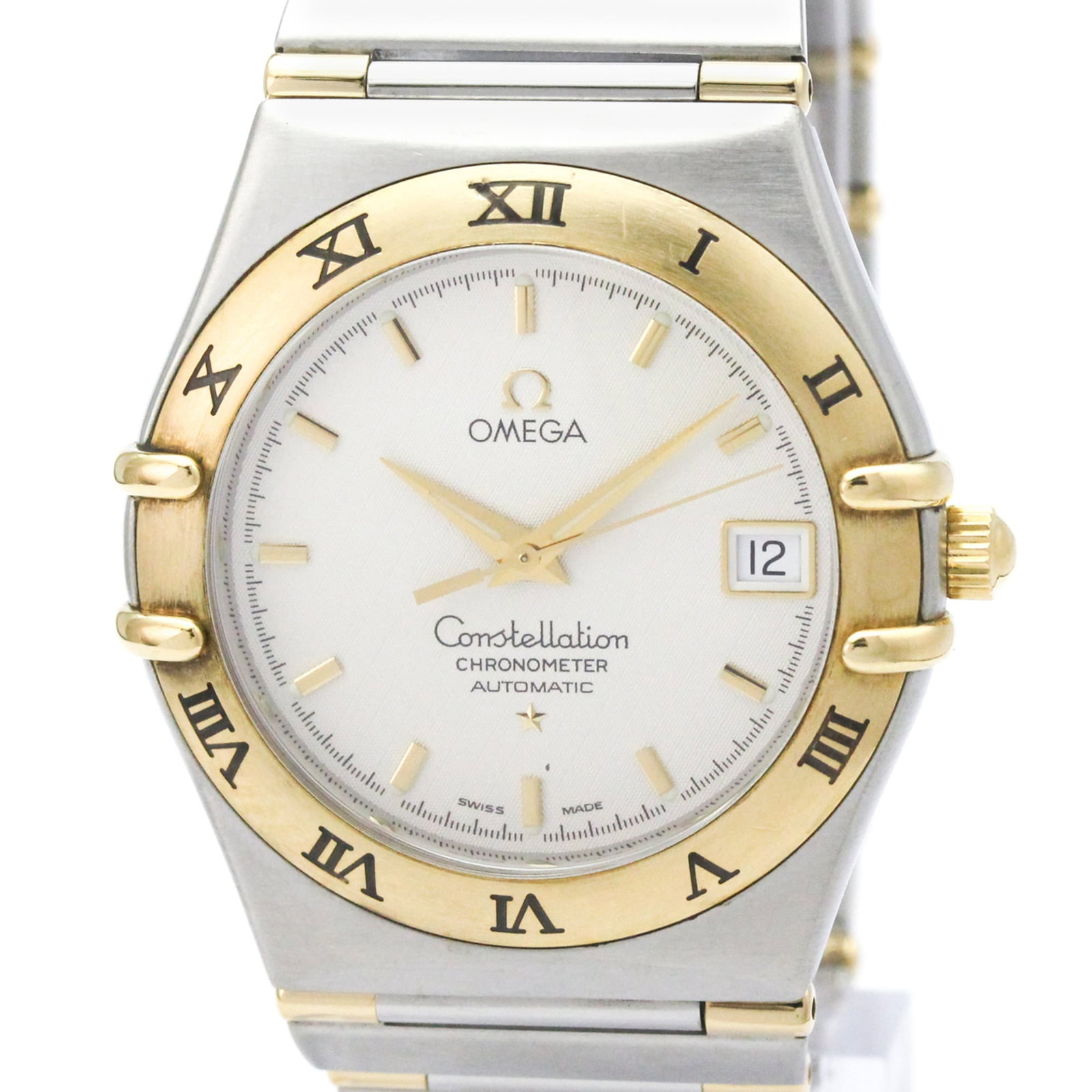 Omega Wristwatch: Omega Wristwatch Stainless steel and yellow gold 18K case and band create a sleek, sophisticated look, while the silver dial and self-winding automatic movement add a touch of elegance. This 36mm Omeg
