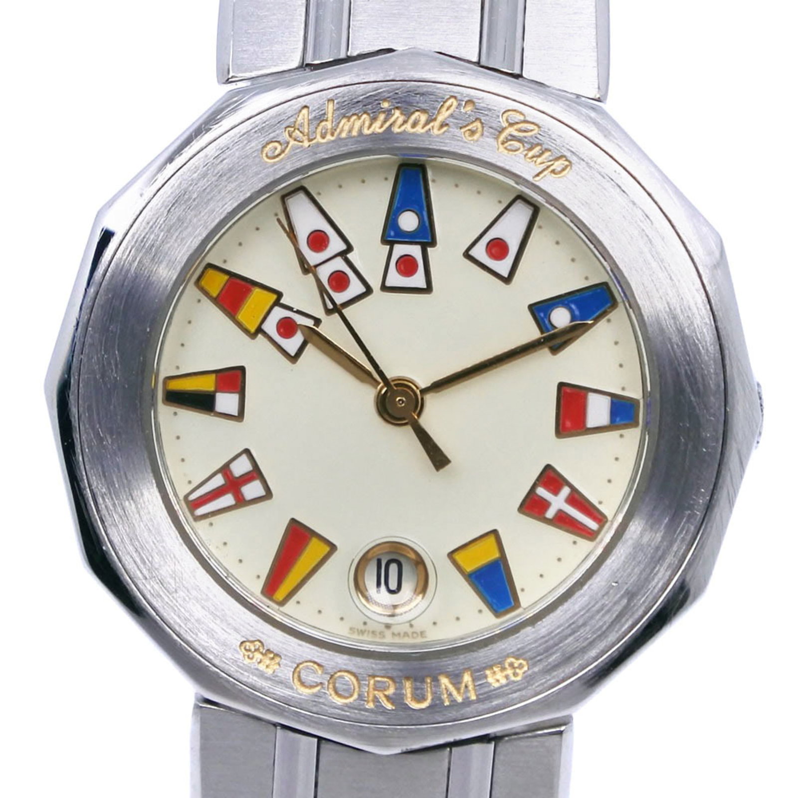 Corum Wristwatch: Corum Wristwatch Stainless steel case and band provide a sleek, modern look for this Corum wristwatch, featuring an ivory dial and quartz movement. Measuring 27mm in diameter, it's designed to fit a w