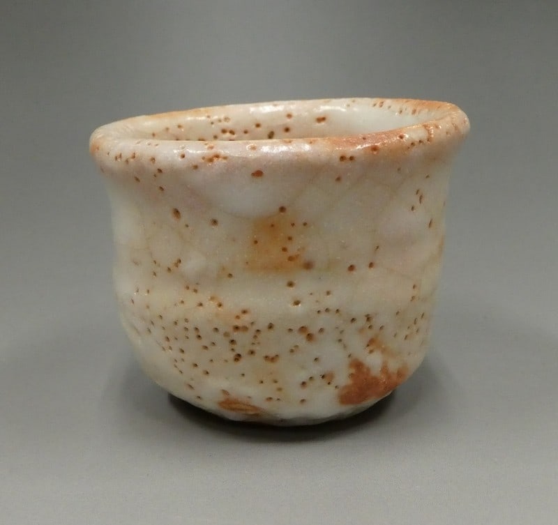 Osamu Suzuki Guinomi Shino Japanese Ceramic Sake Cup National Living Treasure: Osamu Suzuki Guinomi Shino Japanese Ceramic Sake Cup National Living Treasure Item Specifics: Artist: Osamu Suzuki Subject: Sake Cup (Guinomi) Material: Glazed Stoneware Style: Japanese Year Of Produc