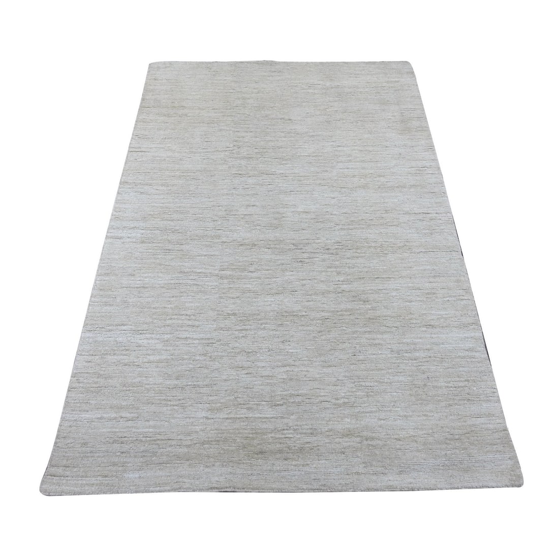 4'x5'10" Ivory Plain Solid Pattern Hand Knotted Ghazni Wool Oriental Rug: 4'x5'10" Ivory Plain Solid Pattern Hand Knotted Ghazni Wool Oriental Rug This stunning 4'x5'10" hand-knotted Ghazni wool Oriental rug boasts a beautiful ivory plain solid pattern, perfectly suited for