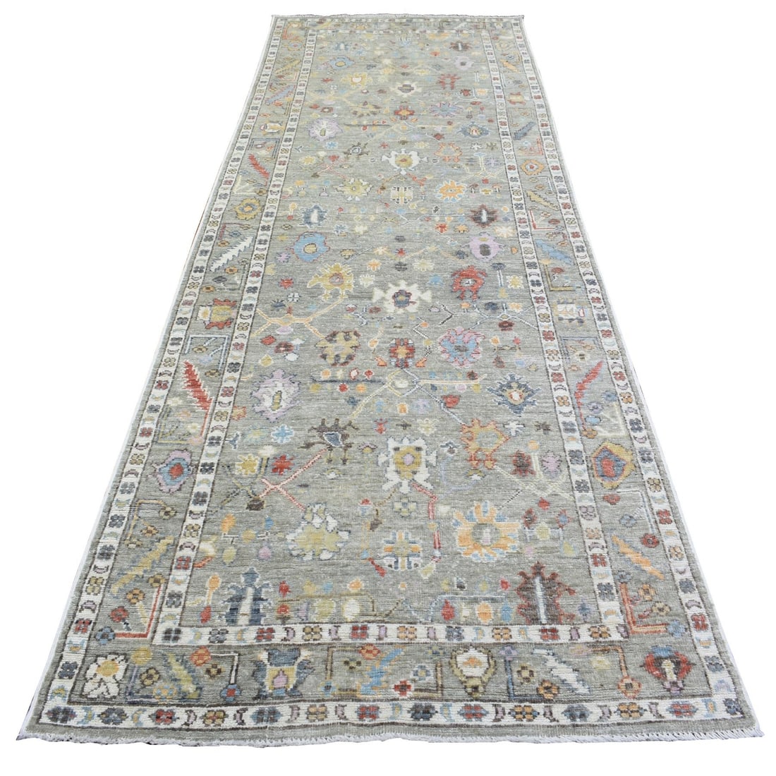 4'x11'10" Taupe Afghan Angora Oushak Soft Wool Hand Knotted Runner Rug: 4'x11'10" Taupe Afghan Angora Oushak Soft Wool Hand Knotted Runner Rug Soft and luxurious, this 4'x11'10" Taupe Afghan Angora Oushak wool hand-knotted runner rug boasts a stunning grey field with intr