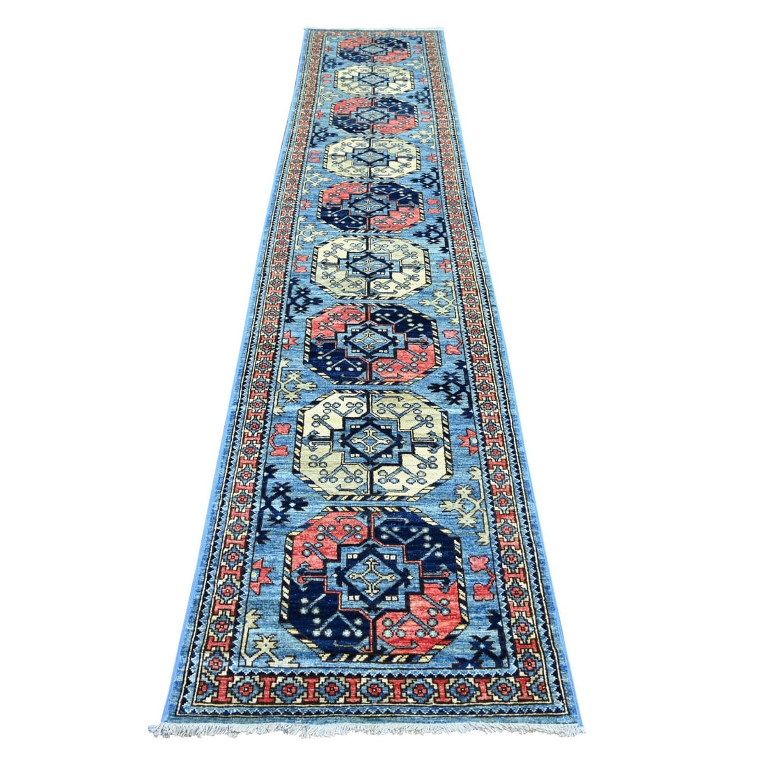 2'6"x12' Blue Afghan Ersari Elephant Feet Design Hand Knotted Wool Runner: 2'6"x12' Blue Afghan Ersari Elephant Feet Design Hand Knotted Wool Runner Beautifully crafted with intricate geometric patterns, this stunning Afghan-style wool runner boasts a striking blue field wit