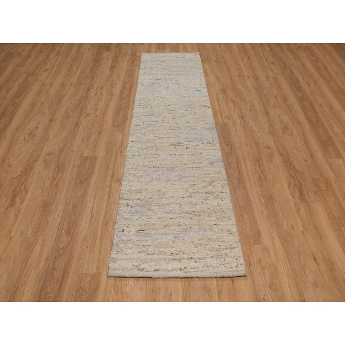 2'7"x10'2" Ivory Textured Modern Design Pure Wool Hand Knotted Runner Rug: 2'7"x10'2" Ivory Textured Modern Design Pure Wool Hand Knotted Runner Rug Ivory Textured Modern Design Pure Wool Hand Knotted Runner Rug boasts a striking 2'7" x 10'2" size, making it a versatile addi
