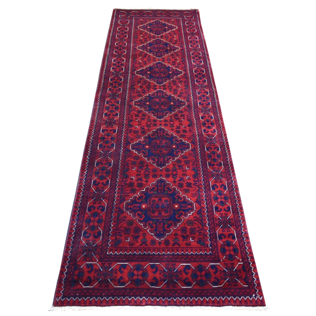 Red Tribal Design Afghan Khamyab Wool Hand Knotted Runner Rug 2'8"x9'7: Red Tribal Design Afghan Khamyab Wool Hand Knotted Runner Rug 2'8"x9'7 Red Tribal Design Afghan Khamyab Wool Hand Knotted Runner Rug 2'8"x9'7 is a stunning piece of 100% wool craftsmanship, boasting a