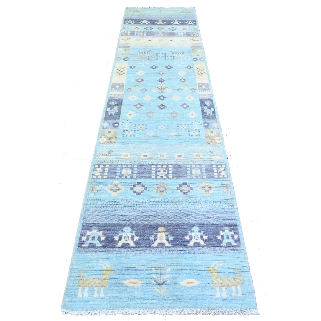 2'8"x11' Blue Fine Kashkuli Gabbeh Soft Wool Hand Knotted Rug: 2'8"x11' Blue Fine Kashkuli Gabbeh Soft Wool Hand Knotted Rug Hand-knotted in Afghanistan, this 2'8"x11' blue fine Kashkuli Gabbeh soft wool rug boasts a stunning Oriental design with a subtle regiona