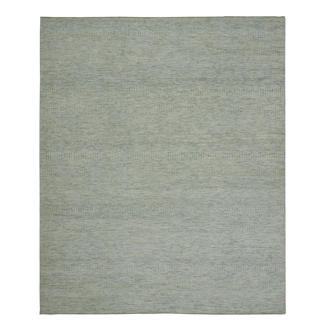 8'1"x9'10" Ivory Modern Grass Hand Knotted Sustainable Textile Wool Rug: 8'1"x9'10" Ivory Modern Grass Hand Knotted Sustainable Textile Wool Rug Made from 100% wool, this 8'1"x9'10" ivory-colored rug boasts a unique grass hand-knotted design. Its sustainable textile constr