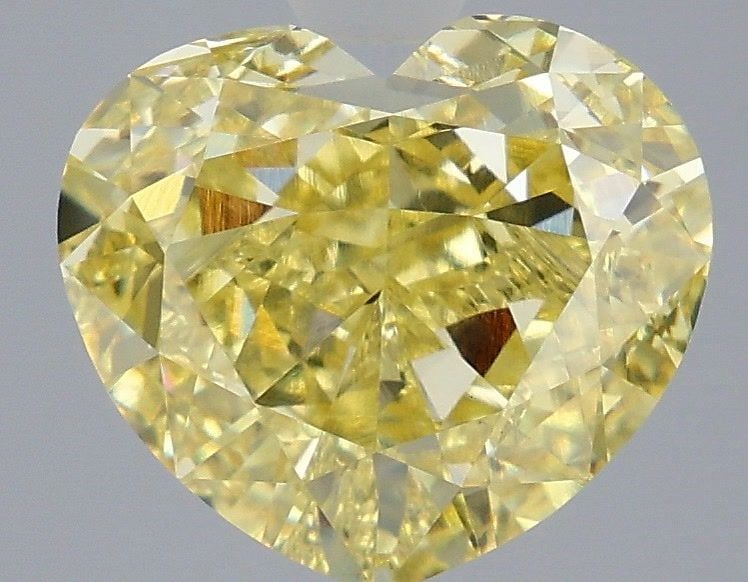 IGI Heart 4.6ct Fancy Intense Yellow VVS2 - Loose Lab Diamond: IGI Heart 4.6ct Fancy Intense Yellow VVS2 - Loose Lab Diamond Item Specifics: Source: This Is A Real Diamond Grown In A Lab Not Mined. Carat: 4.6 Cut: - Color: Fancy Intense Yellow Clarity: VVS2 Polis