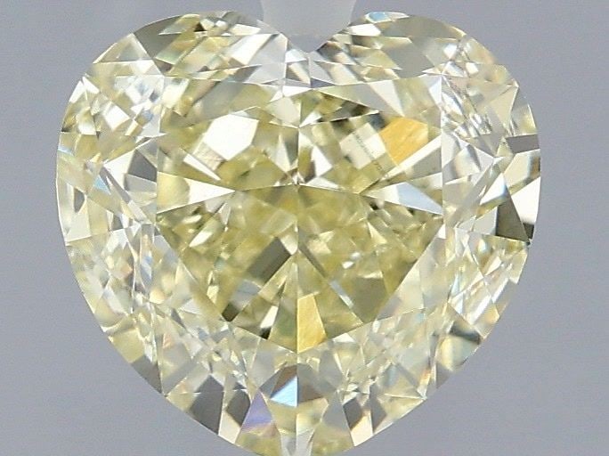 IGI Heart 2.6ct Fancy Yellow VVS2 - Loose Lab Diamond: IGI Heart 2.6ct Fancy Yellow VVS2 - Loose Lab Diamond Item Specifics: Source: This Is A Real Diamond Grown In A Lab Not Mined. Carat: 2.6 Cut: - Color: Fancy Yellow Clarity: VVS2 Polish: EX Symmetry: 