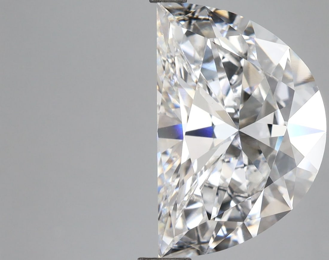 IGI Half Moon 5.07ct E VVS2 - Loose Lab Diamond: IGI Half Moon 5.07ct E VVS2 - Loose Lab Diamond Item Specifics: Source: This Is A Real Diamond Grown In A Lab Not Mined. Carat: 5.07 Cut: - Color: E Clarity: VVS2 Polish: EX Symmetry: EX Measurements: