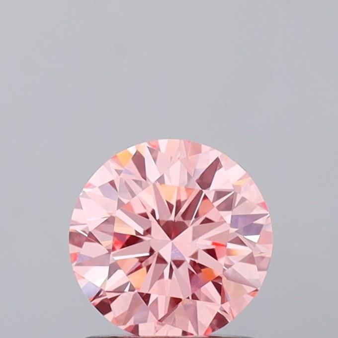 IGI Round 1.04ct Fancy Vivid Pink VVS2 - Loose Lab Diamond: IGI Round 1.04ct Fancy Vivid Pink VVS2 - Loose Lab Diamond Item Specifics: Source: This Is A Real Diamond Grown In A Lab Not Mined. Carat: 1.04 Cut: VG Color: Fancy Vivid Pink Clarity: VVS2 Polish: VG