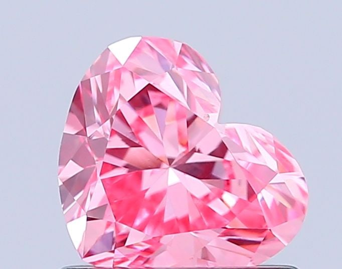 IGI Heart 0.86ct Fancy Vivid Pink VVS2 - Loose Lab Diamond: IGI Heart 0.86ct Fancy Vivid Pink VVS2 - Loose Lab Diamond Item Specifics: Source: This Is A Real Diamond Grown In A Lab Not Mined. Carat: 0.86 Cut: - Color: Fancy Vivid Pink Clarity: VVS2 Polish: VG 