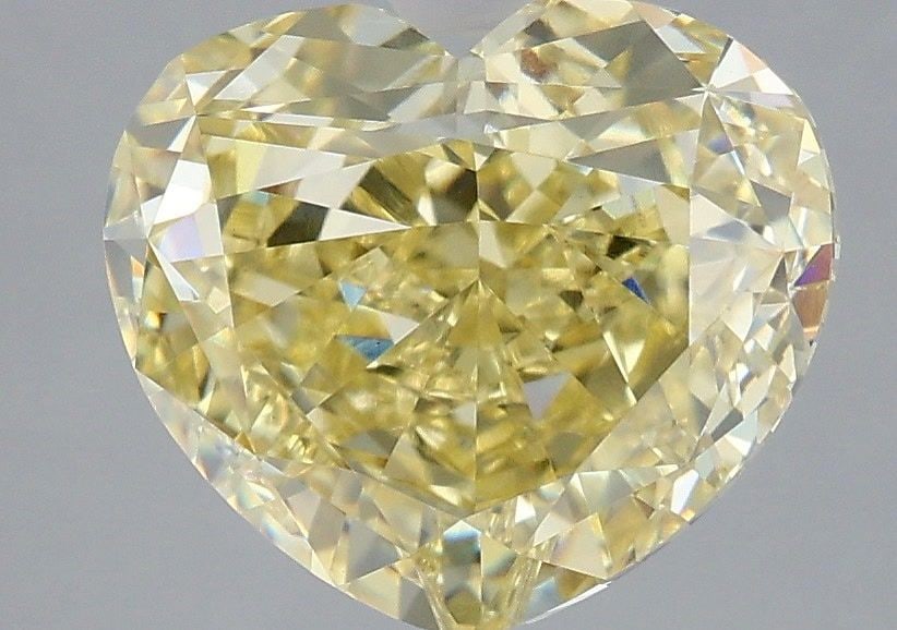 IGI Heart 4.53ct Fancy Intense Yellow VVS2 - Loose Lab Diamond: IGI Heart 4.53ct Fancy Intense Yellow VVS2 - Loose Lab Diamond Item Specifics: Source: This Is A Real Diamond Grown In A Lab Not Mined. Carat: 4.53 Cut: - Color: Fancy Intense Yellow Clarity: VVS2 Pol