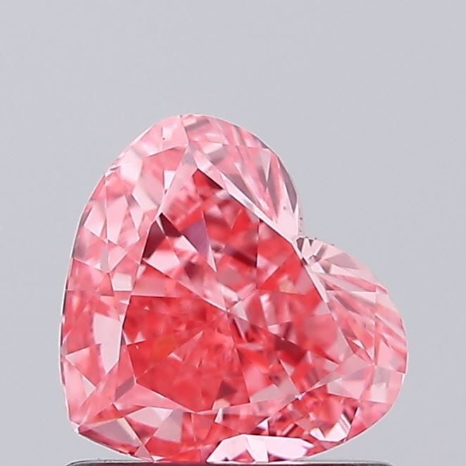 IGI Heart 0.77ct Fancy Vivid Pink VVS2 - Loose Lab Diamond: IGI Heart 0.77ct Fancy Vivid Pink VVS2 - Loose Lab Diamond Item Specifics: Source: This Is A Real Diamond Grown In A Lab Not Mined. Carat: 0.77 Cut: - Color: Fancy Vivid Pink Clarity: VVS2 Polish: VG 