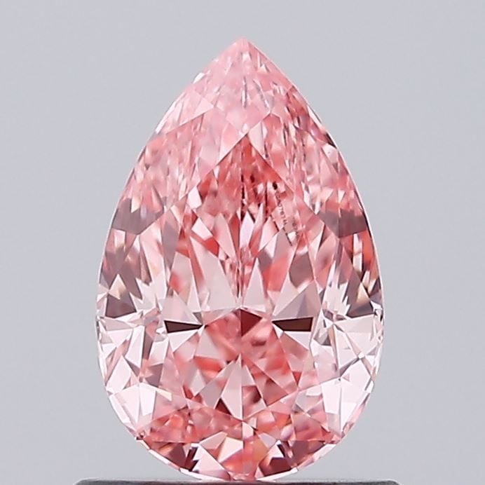 IGI Pear 1.04ct Fancy Vivid Pink VVS2 - Loose Lab Diamond: IGI Pear 1.04ct Fancy Vivid Pink VVS2 - Loose Lab Diamond Item Specifics: Source: This Is A Real Diamond Grown In A Lab Not Mined. Carat: 1.04 Cut: - Color: Fancy Vivid Pink Clarity: VVS2 Polish: EX