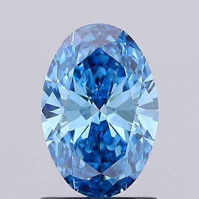 IGI Oval 1.09ct Fancy Vivid Blue VVS2 - Loose Lab Diamond: IGI Oval 1.09ct Fancy Vivid Blue VVS2 - Loose Lab Diamond Item Specifics: Source: This Is A Real Diamond Grown In A Lab Not Mined. Carat: 1.09 Cut: - Color: Fancy Vivid Blue Clarity: VVS2 Polish: EX S