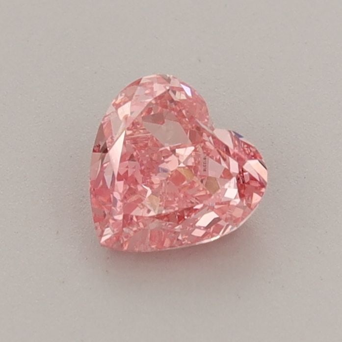 IGI Heart 0.58ct Fancy Vivid Pink VVS2 - Loose Lab Diamond: IGI Heart 0.58ct Fancy Vivid Pink VVS2 - Loose Lab Diamond Item Specifics: Source: This Is A Real Diamond Grown In A Lab Not Mined. Carat: 0.58 Cut: - Color: Fancy Vivid Pink Clarity: VVS2 Polish: VG 
