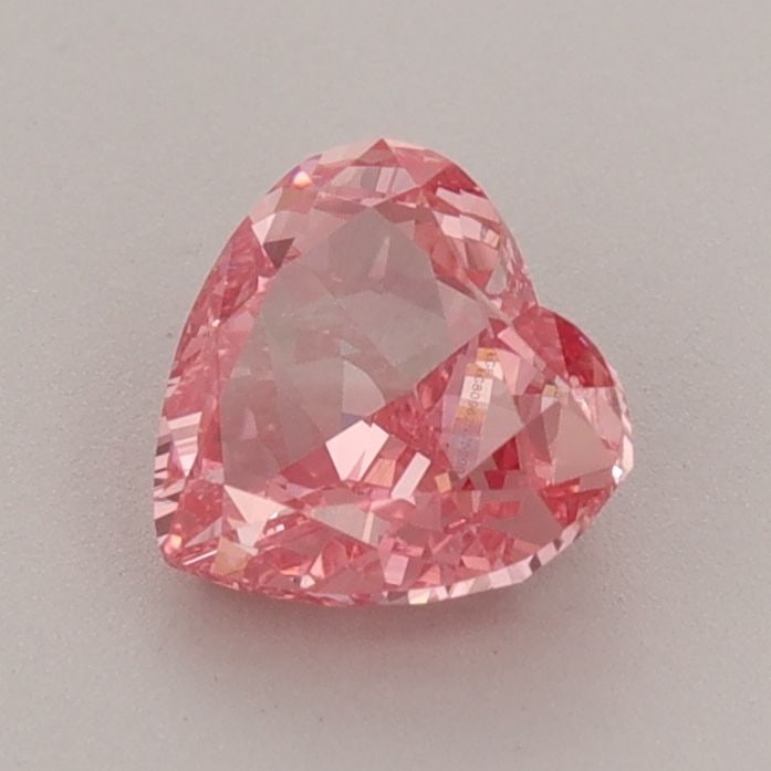 IGI Heart 1.02ct Fancy Vivid Pink VVS2 - Loose Lab Diamond: IGI Heart 1.02ct Fancy Vivid Pink VVS2 - Loose Lab Diamond Item Specifics: Source: This Is A Real Diamond Grown In A Lab Not Mined. Carat: 1.02 Cut: - Color: Fancy Vivid Pink Clarity: VVS2 Polish: EX 