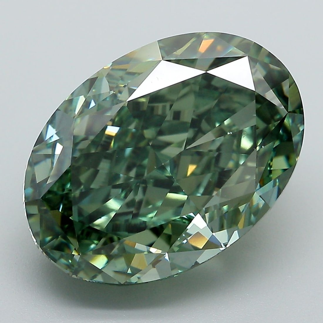 IGI Oval 10.81ct Fancy Vivid Green VVS2 - Loose Lab Diamond: IGI Oval 10.81ct Fancy Vivid Green VVS2 - Loose Lab Diamond Item Specifics: Source: This Is A Real Diamond Grown In A Lab Not Mined. Carat: 10.81 Cut: - Color: Fancy Vivid Green Clarity: VVS2 Polish: 