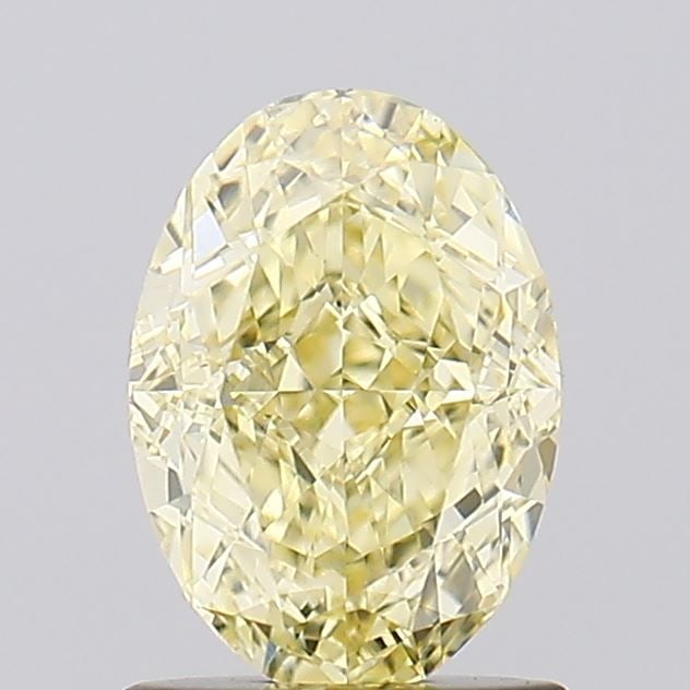 IGI Oval 1.19ct Fancy Yellow VVS2 - Loose Lab Diamond: IGI Oval 1.19ct Fancy Yellow VVS2 - Loose Lab Diamond Item Specifics: Source: This Is A Real Diamond Grown In A Lab Not Mined. Carat: 1.19 Cut: - Color: Fancy Yellow Clarity: VVS2 Polish: VG Symmetry: