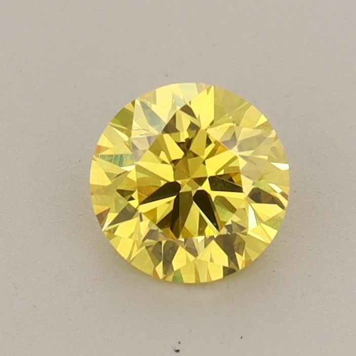 IGI Round 0.6ct Fancy Vivid Yellow VVS2 - Ideal Loose Lab Diamond: IGI Round 0.6ct Fancy Vivid Yellow VVS2 - Ideal Loose Lab Diamond Item Specifics: Source: This Is A Real Diamond Grown In A Lab Not Mined. Carat: 0.6 Cut: ID Color: Fancy Vivid Yellow Clarity: VVS2 Po