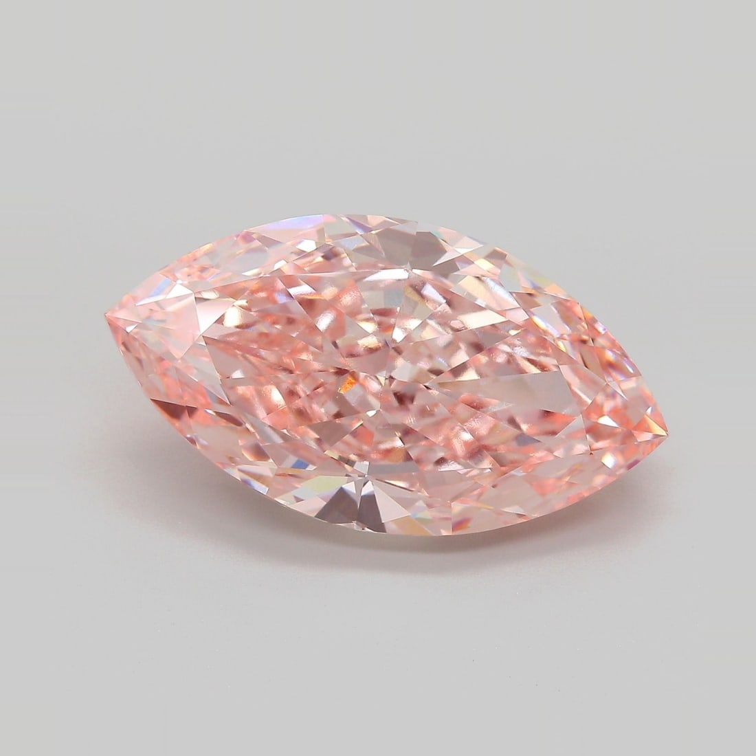 IGI Marquise 12.01ct Fancy Vivid Pink VVS2 - Loose Lab Diamond: IGI Marquise 12.01ct Fancy Vivid Pink VVS2 - Loose Lab Diamond Item Specifics: Source: This Is A Real Diamond Grown In A Lab Not Mined. Carat: 12.01 Cut: - Color: Fancy Vivid Pink Clarity: VVS2 Polish