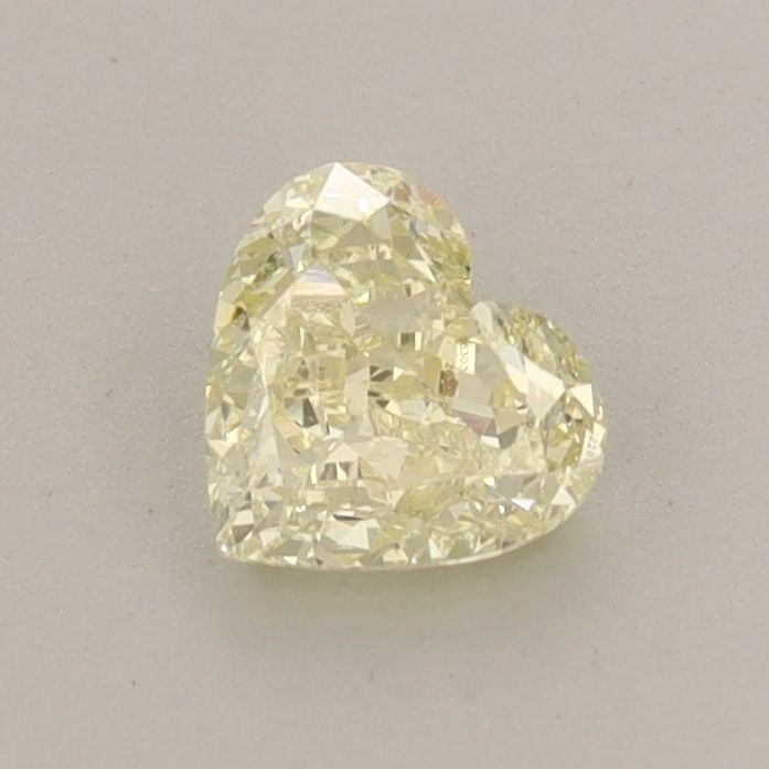 IGI Heart 0.57ct Fancy Yellow VVS2 - Loose Lab Diamond: IGI Heart 0.57ct Fancy Yellow VVS2 - Loose Lab Diamond Item Specifics: Source: This Is A Real Diamond Grown In A Lab Not Mined. Carat: 0.57 Cut: - Color: Fancy Yellow Clarity: VVS2 Polish: VG Symmetry