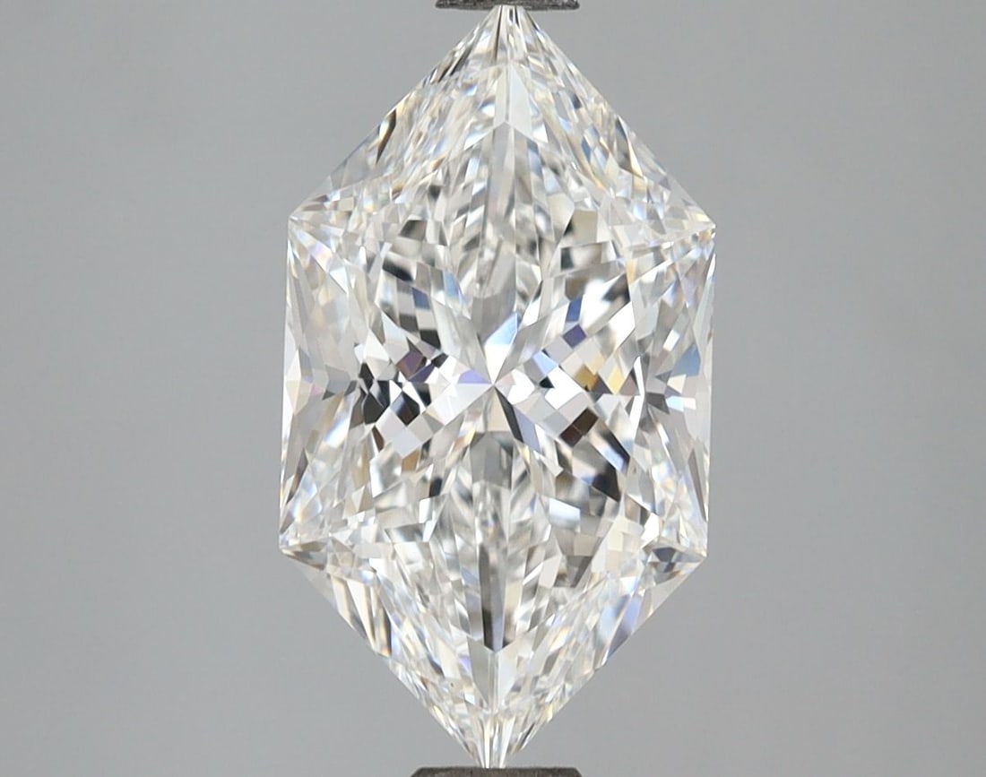IGI Hexagonal 4.09ct E VVS2 - Loose Lab Diamond: IGI Hexagonal 4.09ct E VVS2 - Loose Lab Diamond Item Specifics: Source: This Is A Real Diamond Grown In A Lab Not Mined. Carat: 4.09 Cut: - Color: E Clarity: VVS2 Polish: EX Symmetry: EX Measurements: