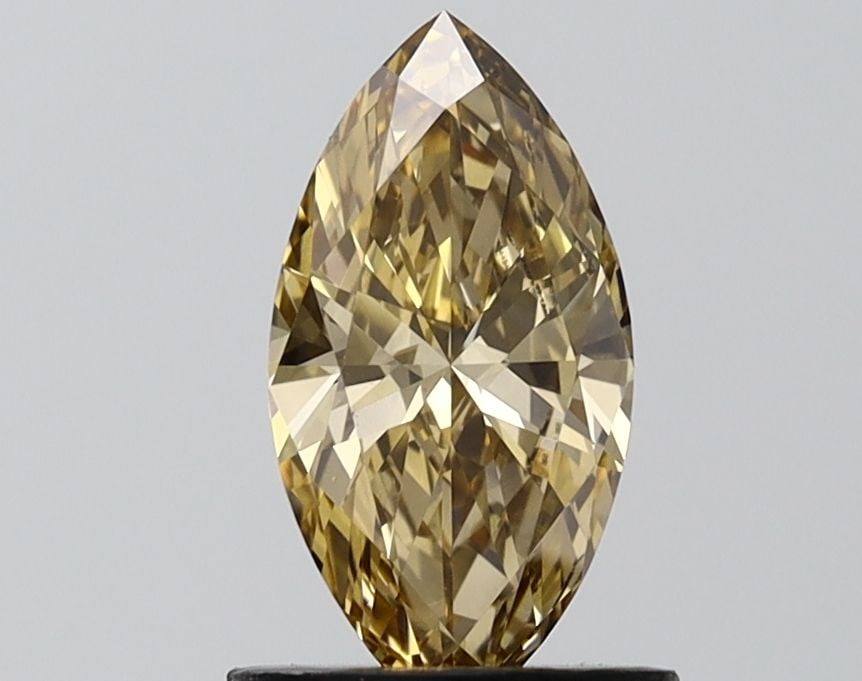 IGI Marquise 1.0ct Fancy Light Brown VVS2 - Loose Lab Diamond: IGI Marquise 1.0ct Fancy Light Brown VVS2 - Loose Lab Diamond Item Specifics: Source: This Is A Real Diamond Grown In A Lab Not Mined. Carat: 1.0 Cut: - Color: Fancy Light Brown Clarity: VVS2 Polish:
