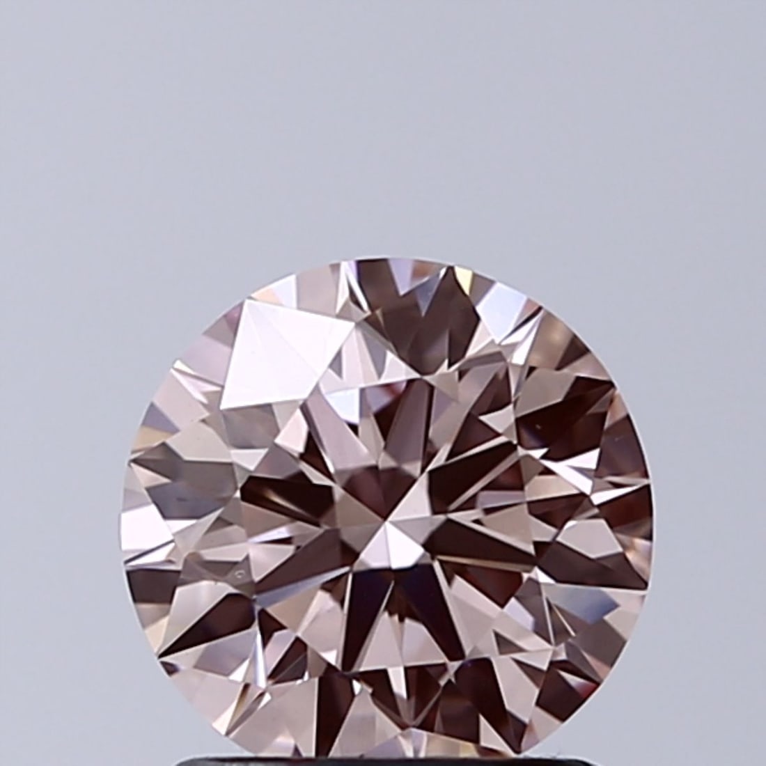 IGI Round 1.21ct Fancy Pink VVS2 - Ideal Loose Lab Diamond: IGI Round 1.21ct Fancy Pink VVS2 - Ideal Loose Lab Diamond Item Specifics: Source: This Is A Real Diamond Grown In A Lab Not Mined. Carat: 1.21 Cut: ID Color: Fancy Pink Clarity: VVS2 Polish: EX Symme