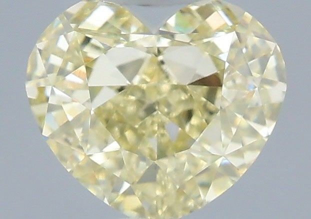 IGI Heart 1.07ct Fancy Yellow VVS2 - Loose Lab Diamond: IGI Heart 1.07ct Fancy Yellow VVS2 - Loose Lab Diamond Item Specifics: Source: This Is A Real Diamond Grown In A Lab Not Mined. Carat: 1.07 Cut: - Color: Fancy Yellow Clarity: VVS2 Polish: EX