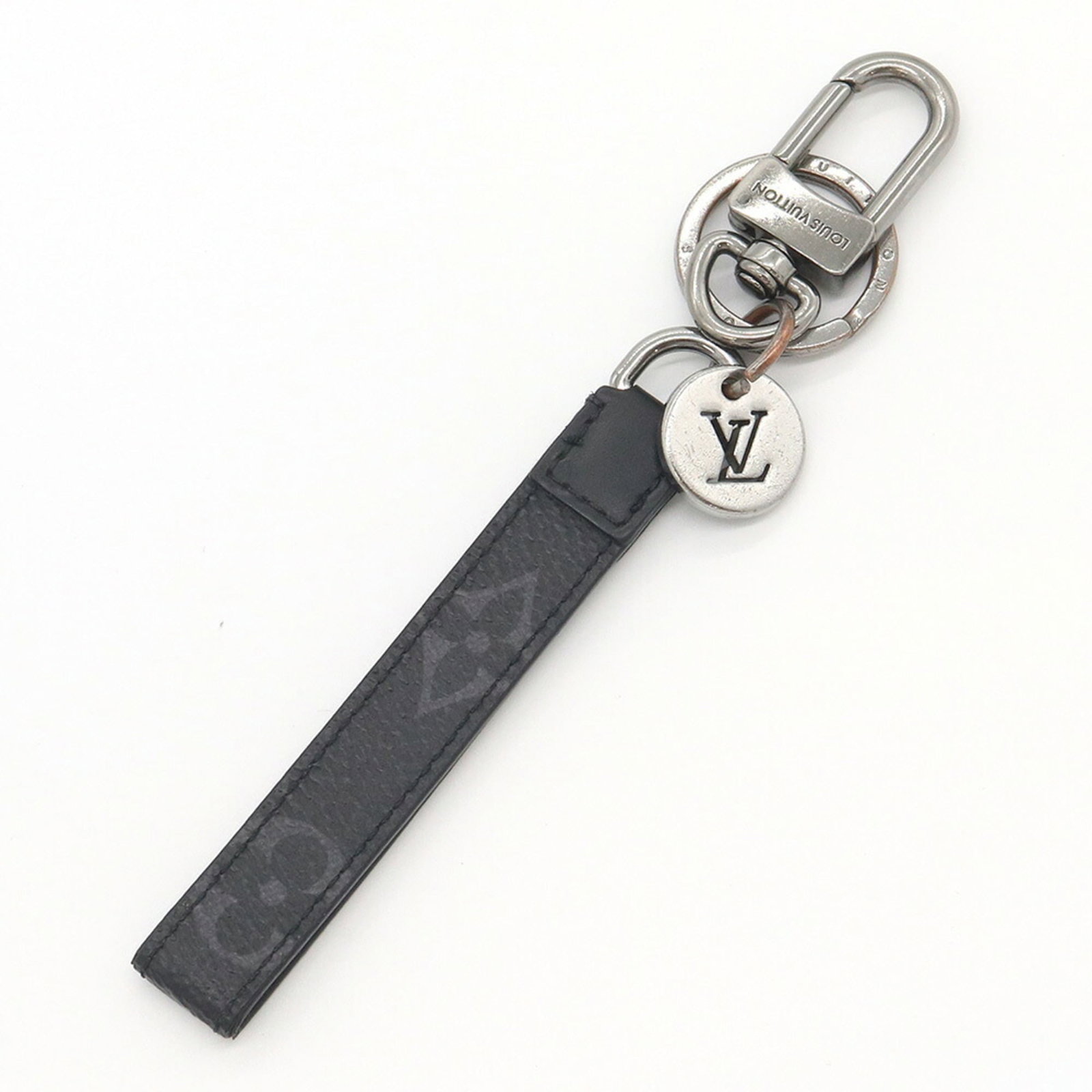 Metal Monogram Keyring Vuitton Empreinte Louis: Metal Monogram Keyring Vuitton Empreinte Louis Metal Monogram Keyring Vuitton Empreinte Louis is a metal keyring featuring the iconic Louis Vuitton Empreinte monogram pattern. Made from metal, this