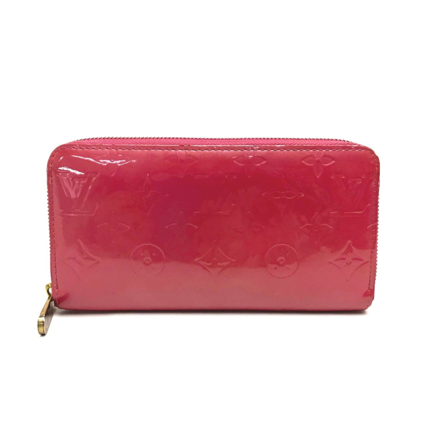 Louis Vuitton Leather Bi Fold Wallet: Louis Vuitton Leather Bi Fold Wallet Pink leather bi-fold wallet from Louis Vuitton, measuring 19.5cm x 10.5cm x 2cm. This long wallet features a signature and is made from high-quality leather. A