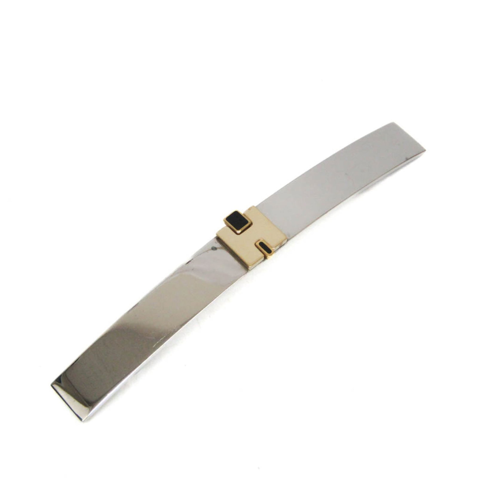 Metal Hermes Barrette: Metal Hermes Barrette The Hermes metal barrette is a gold or silver metal accessory featuring a signature, made in France. Measuring 11cm x 1.2cm, it weighs 24.9g and comes in a box. This barrette is
