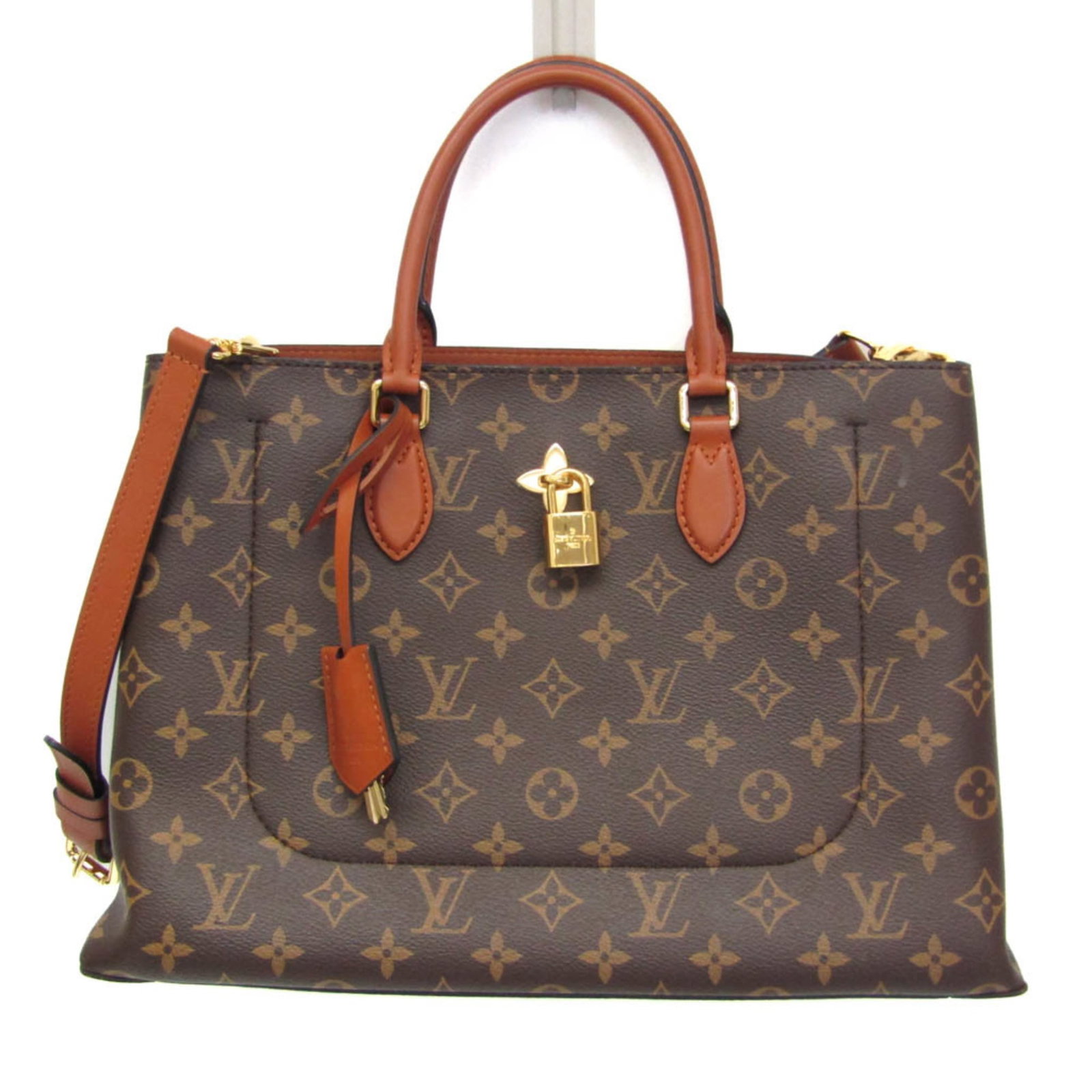 Monogram Leather Shoulder Bag Handbag Louis Vuitton: Monogram Leather Shoulder Bag Handbag Louis Vuitton Monogram Leather Shoulder Bag Handbag Louis Vuitton is a stylish, brown Monogram leather shoulder bag with a classic flower tote design. Measuring