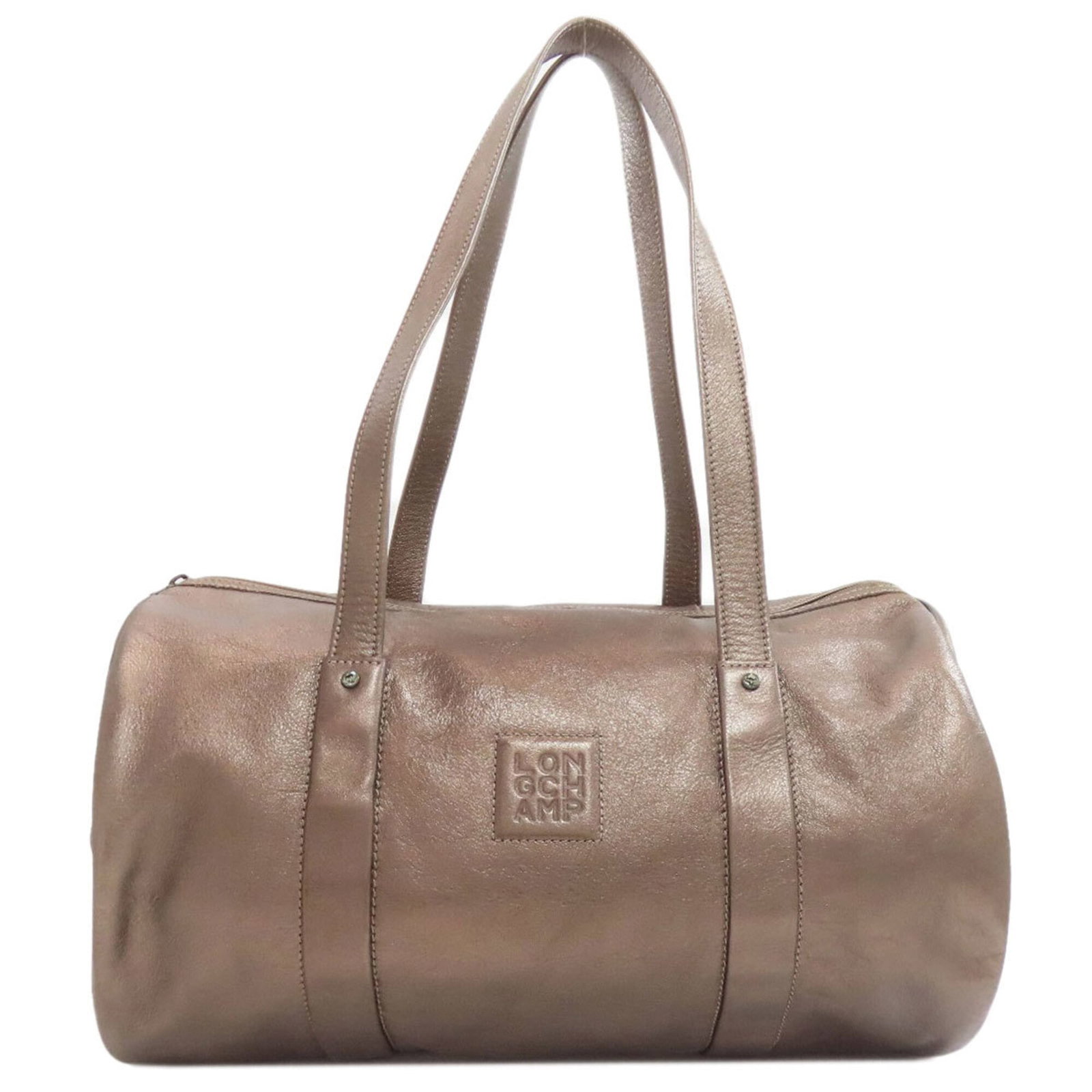 Longchamp Tote Bag Leather: Longchamp Tote Bag Leather Bronze Longchamp Tote Bag features a high-quality leather construction, a classic design with a zipper closure, and a spacious interior with a zipper pocket and open